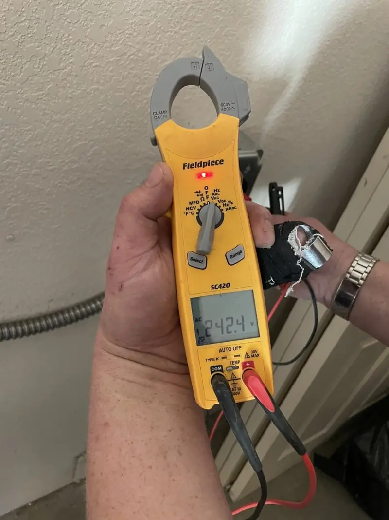 Voltage testing with clamp meter during Generator Installation in Camarillo